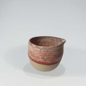 Lille flødekande rosa rose