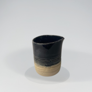 Lille flødekande høj dyb blå nat